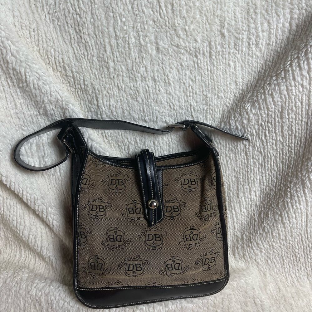 Dooney & Bourke feed bag canvas DB logo brown & black leather trim .